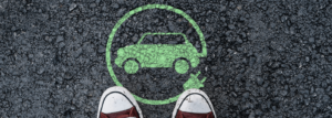 zielona grafika samochód elektryczny na jezdni